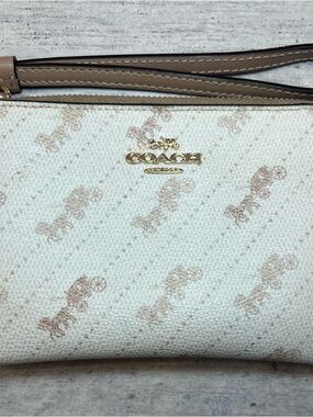 coach white/cream corner zip wristlet with horse and carriage dot print